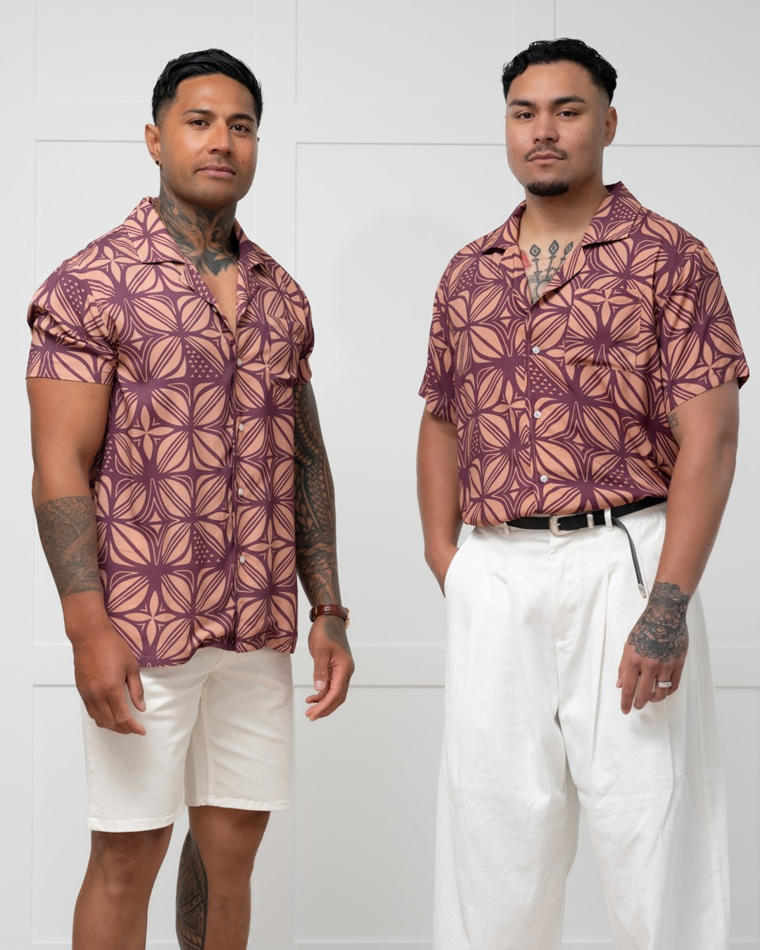 Man wearing a patterned island shirt with a white background